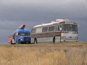 Bus and McCain Vehicle in the Fields
